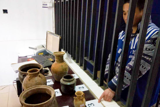 池州警方:千年古墓文物被盗 微信追回50余件